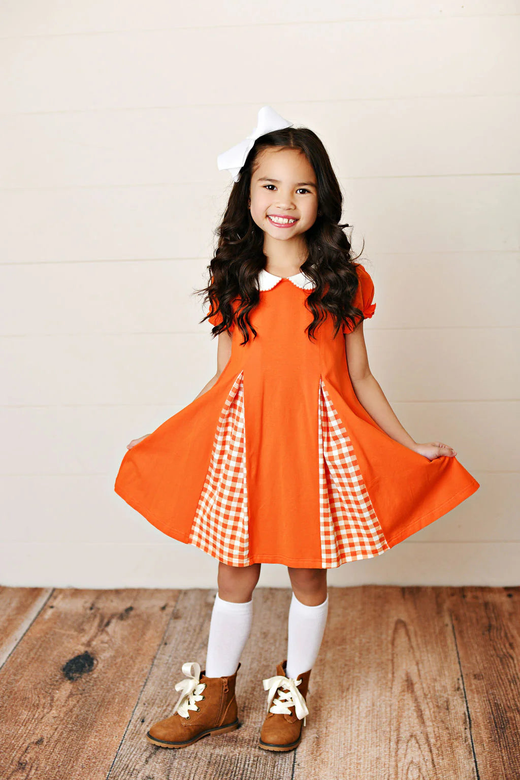 BABY GAME DAY ORANGE GINGHAM PLEAT DRESS